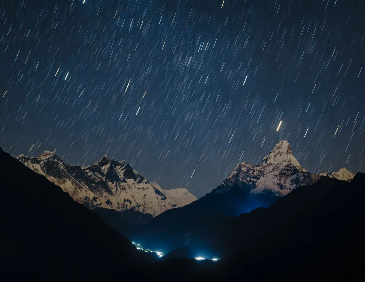 Star trails above Everest and Ama Dablam from the Hotel Everest View on Everest climbing tours, Nepal